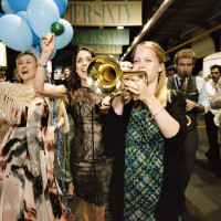 Jazz march in NYC with trumpet player leading the way