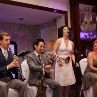 Baby Soda Jazz Band performing New Orleans jazz at an NYC Manhattan wedding | people dancing and swinging